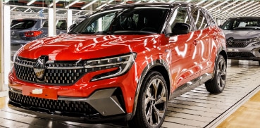 Red Renault car in showroom Red Renault car in showroom